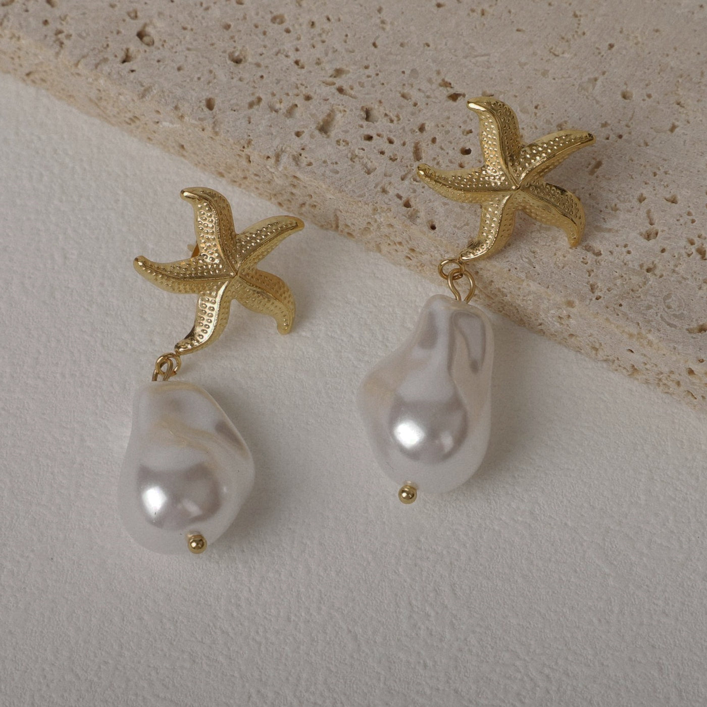 Neptune Baroque Pearl earring