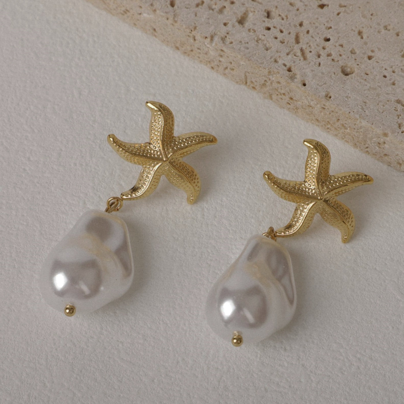 Neptune Baroque Pearl earring