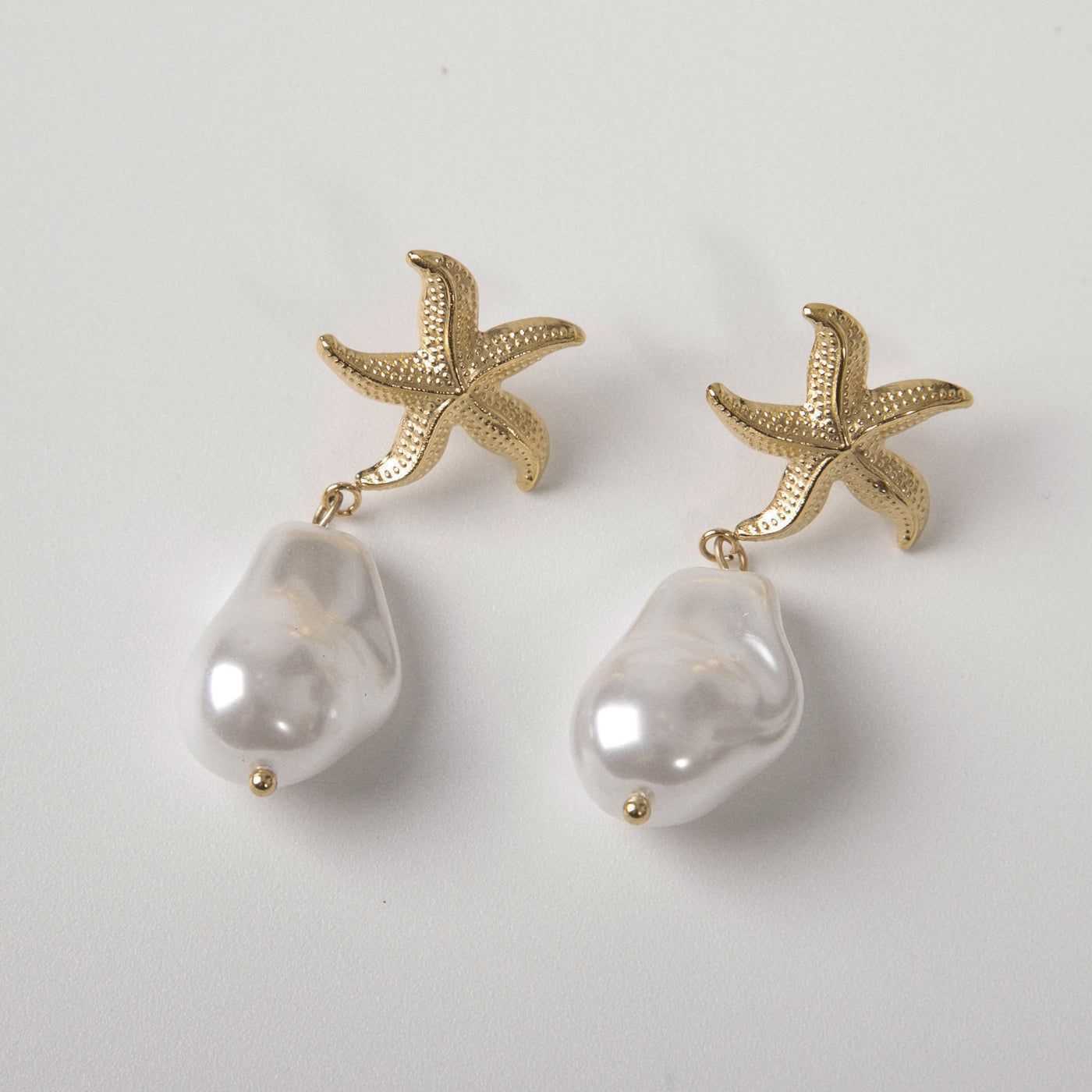 Neptune Baroque Pearl earring