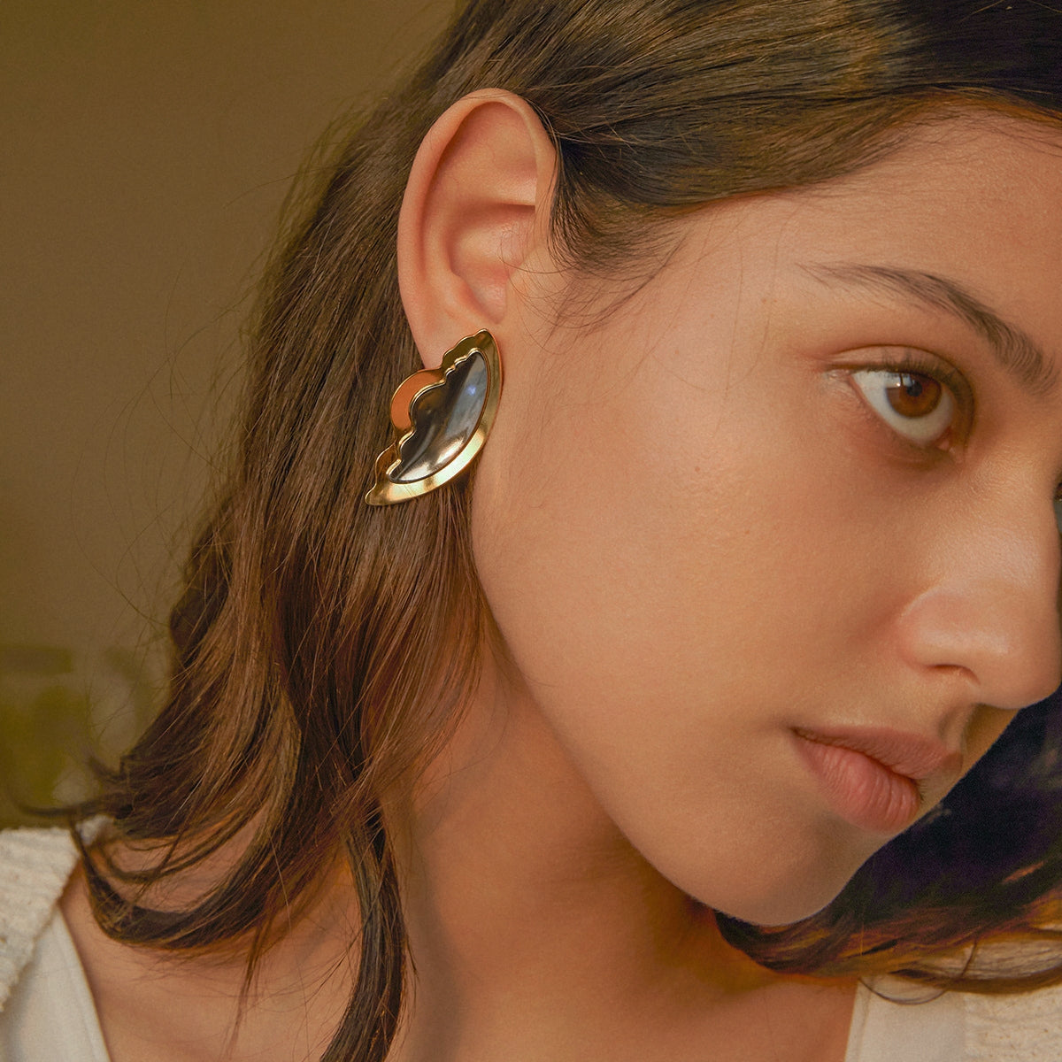 Color-matching wing earring