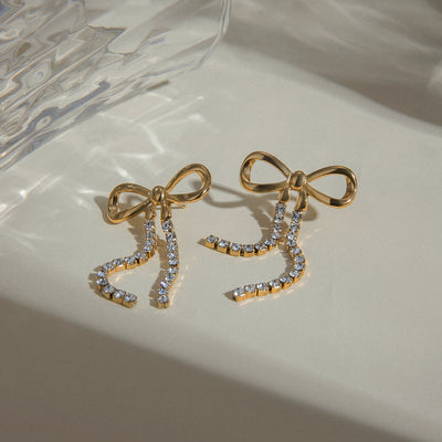 Rhinestone chain earrings with bow