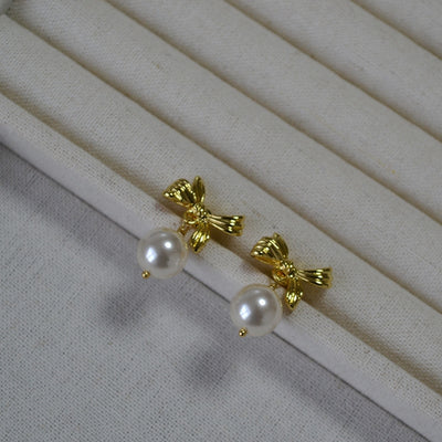 Irregular bow pearl earring